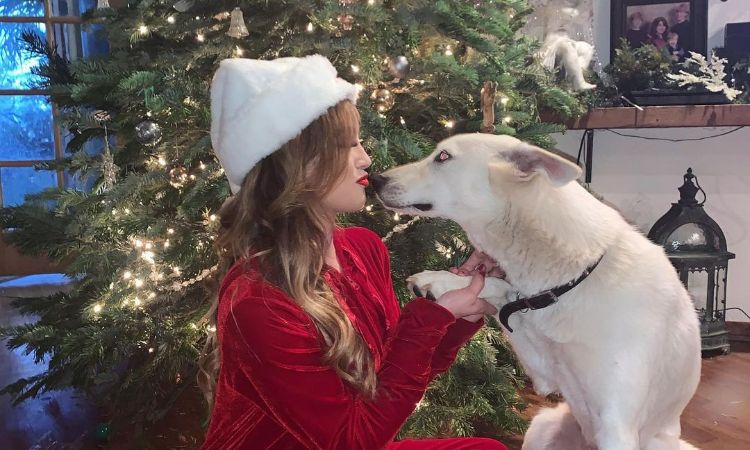 An old picture of Natalie Zettel with her dog.